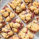 A tray of peanut butter and jelly bars cut into squares