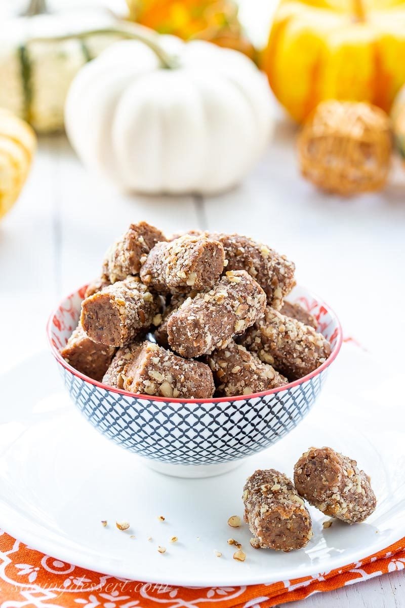 A bowl of date nut rolls flavored with pumpkin pie spice