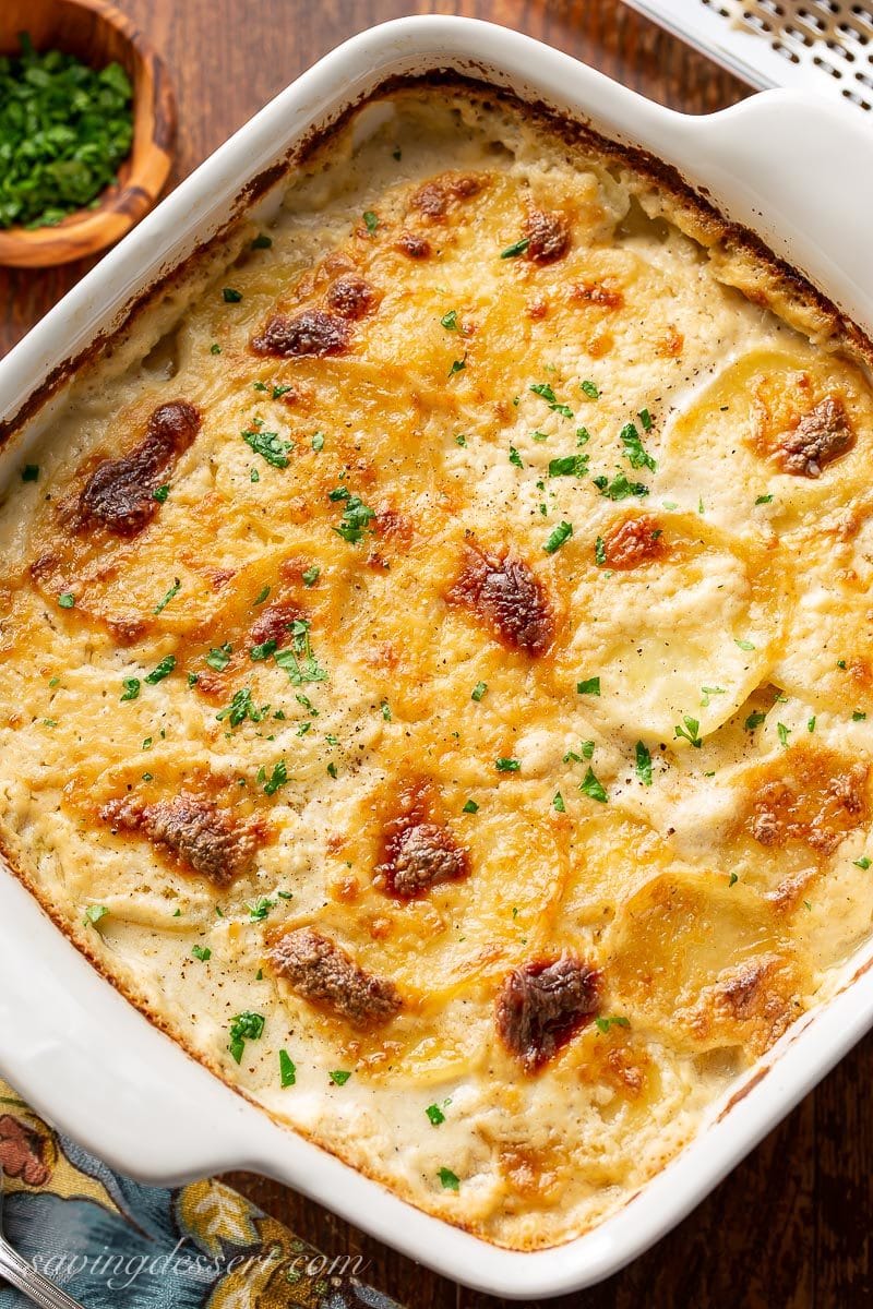 A casserole with cheesy Au Gratin Potatoes baked until golden brown on top