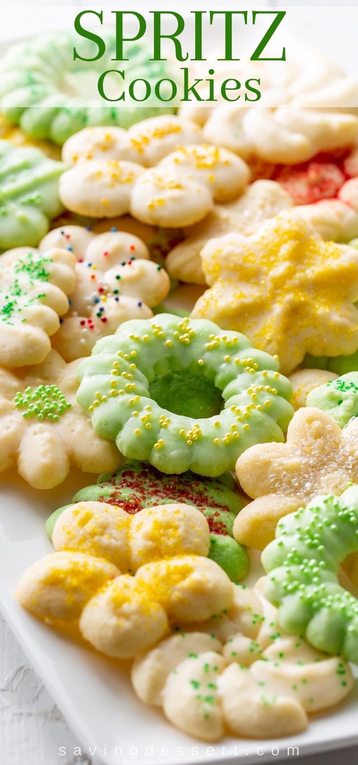 A platter of colorful Spritz Cookies in various designs