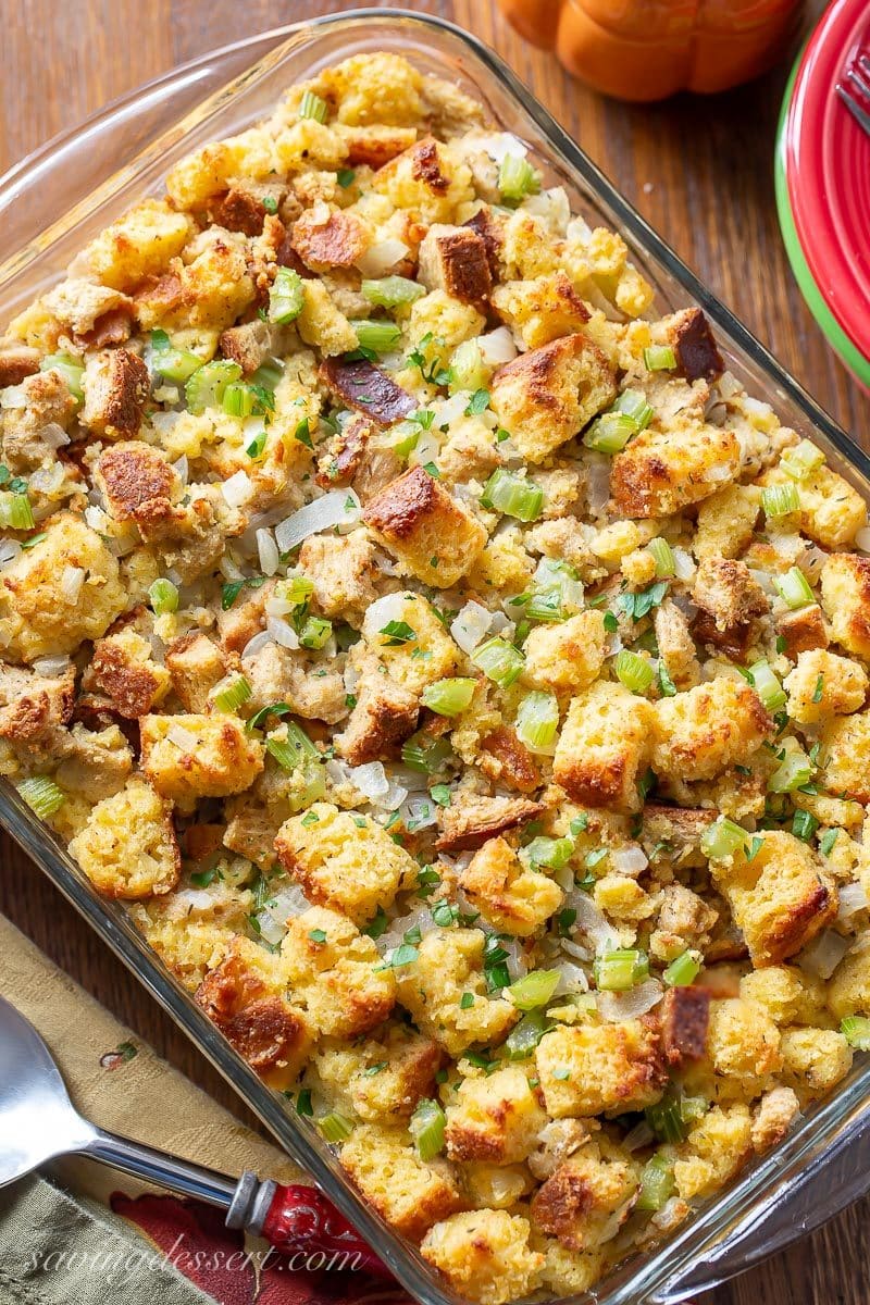 A casserole dish with homemade cornbread dressing with celery, onions, sage and thyme