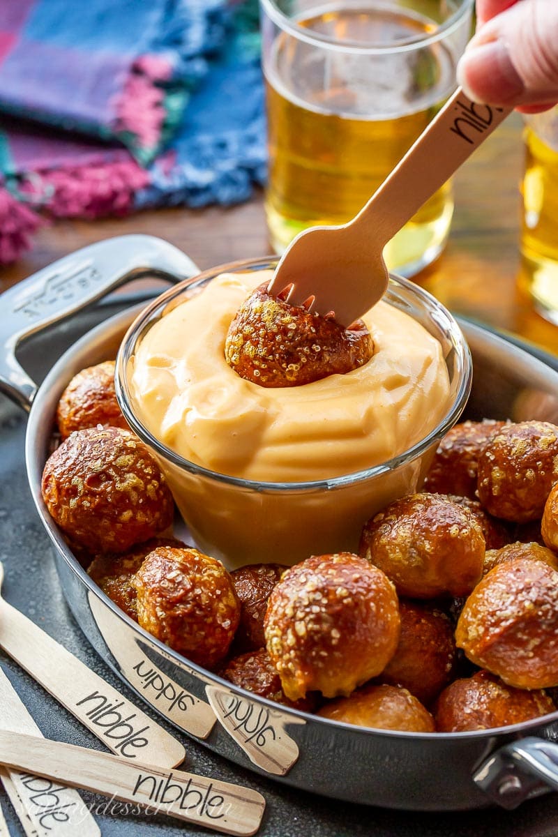 Hot beer cheese dip with pretzel balls
