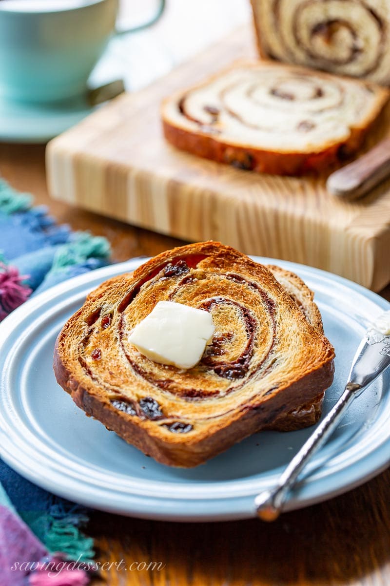 A toasted slice of cinnamon bread with butter on top