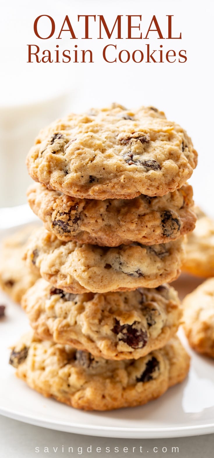 A closeup of a plate of oatmeal raisin cookies