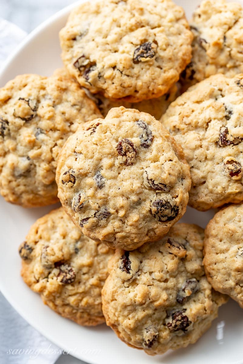 A closeup view of oatmeal raisin cookies on a plate
