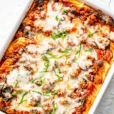 Stuffed Manicotti with sausage and spinach in a casserole dish