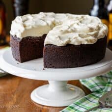 A dark chocolate Guinness cake topped with fluffy white icing