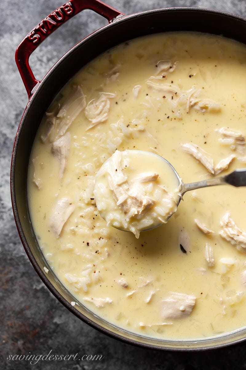 A pot filled with avgolemono chicken and rice soup