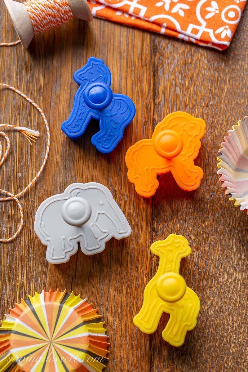 An overhead view of 4 zoo animal cookie stamps