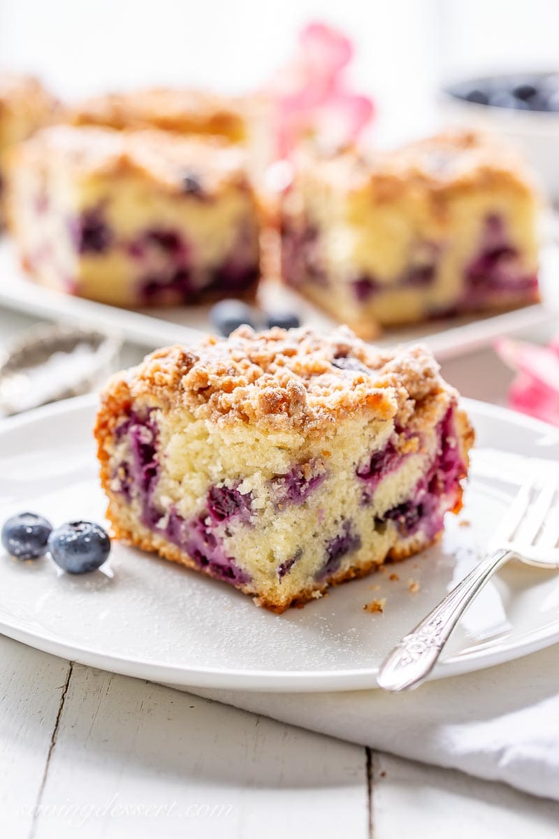 A square of coffee cake with blueberries