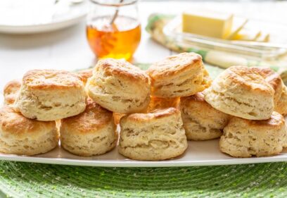 A platter of stacked buttermilk biscuits