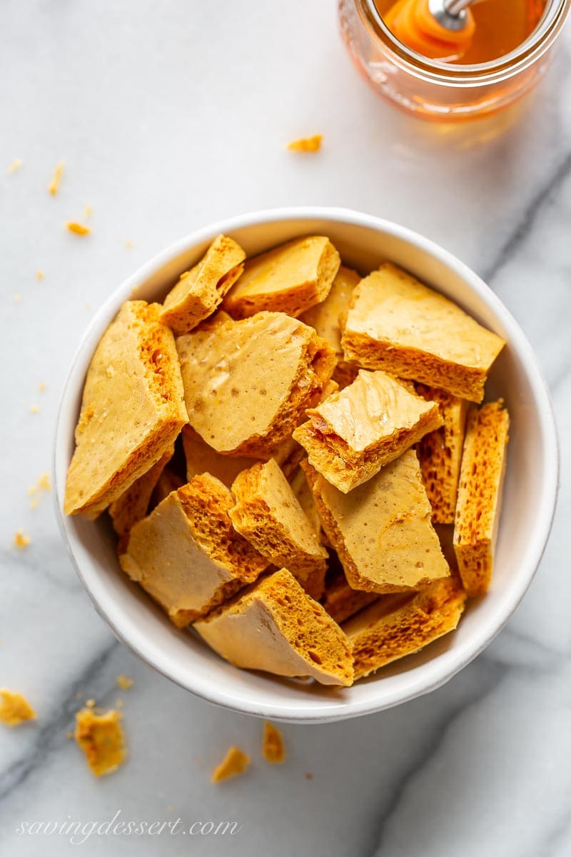 A bowl of honeycomb candy broken into pieces