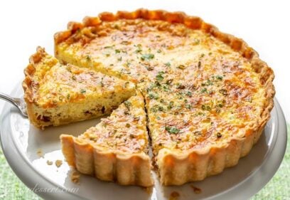 overhead view of sliced classic quiche lorraine