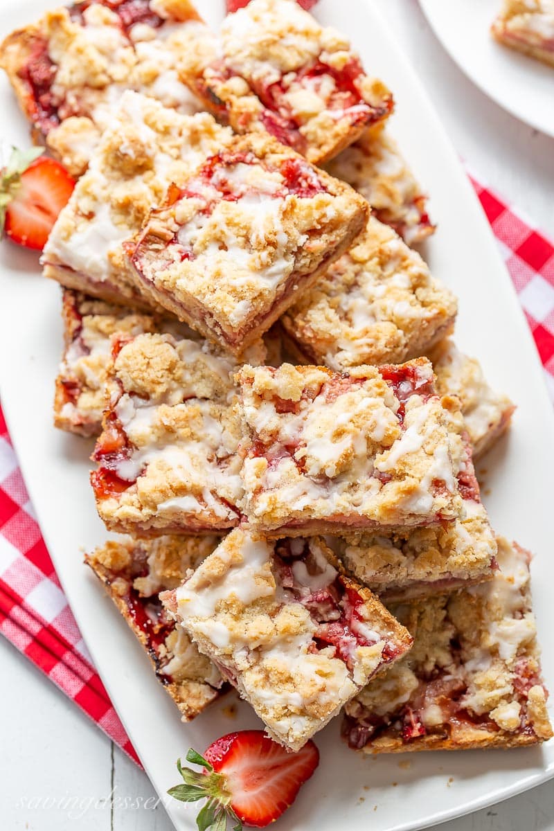 A platter of strawberry rhubarb crumble bars