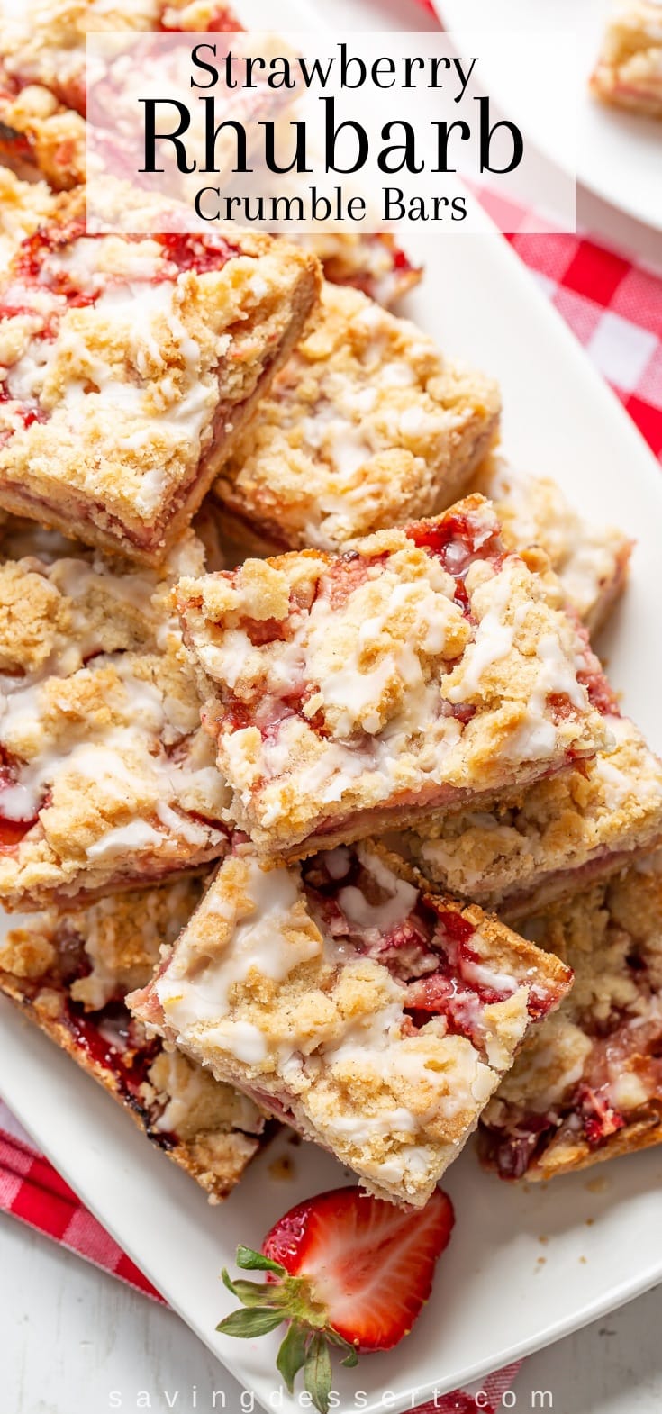 Fruit bars stacked on a platter with strawberries