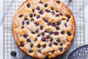 A single layer blackberry cake with sugary top