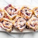 A platter of blueberry sweet rolls
