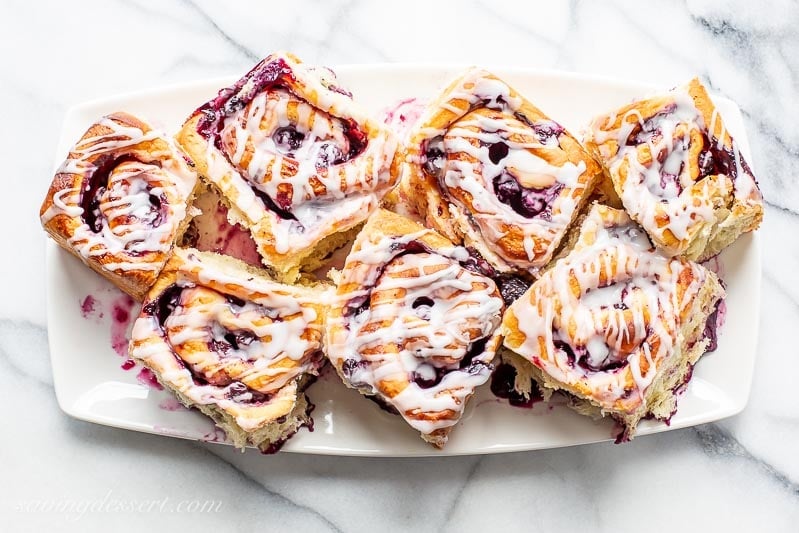 A platter of blueberry sweet rolls