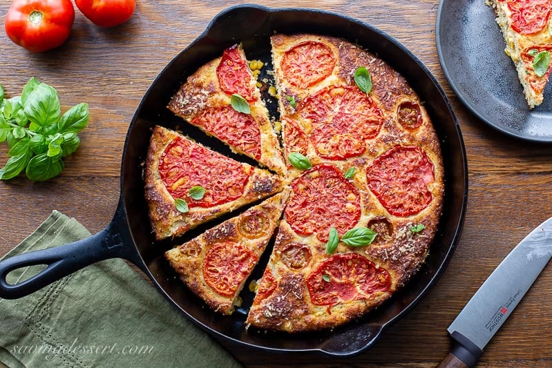 https://www.savingdessert.com/wp-content/uploads/2020/07/Skillet-Cornbread-with-Tomatoes-and-Parmesan-3.jpg