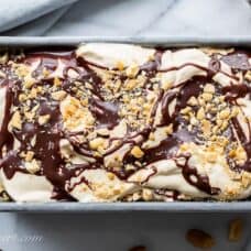 A small loaf pan filled with fudge ripple ice cream