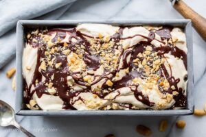 A small loaf pan filled with fudge ripple ice cream