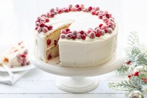 A Cranberry Christmas Cake on a cake stand