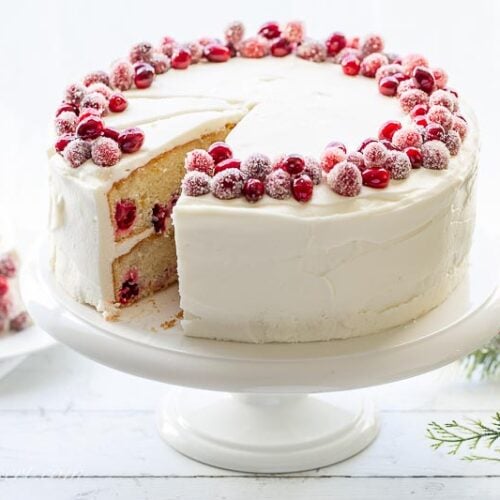 A Cranberry Christmas Cake on a cake stand