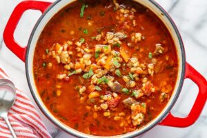 A soup pot filled with beefy barley soup