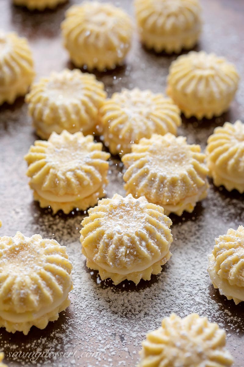 Lemon Sandwich Cookies sprinkled with powdered sugar