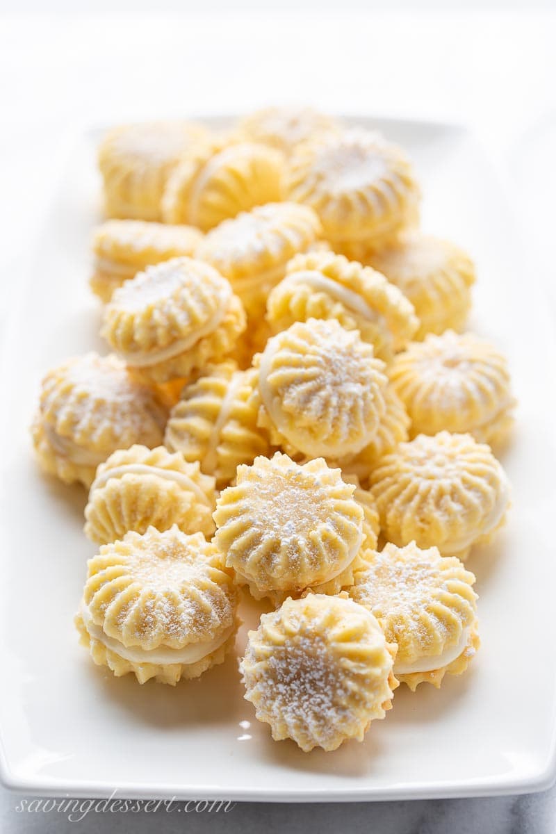 Lemon Cookies with lemon cream filling on a platter