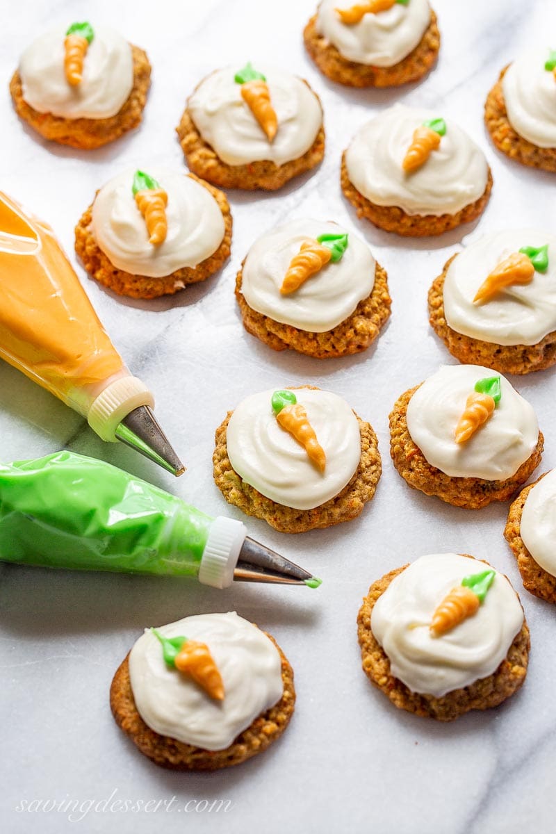 Carrot cake cookies decorated with piped carrots