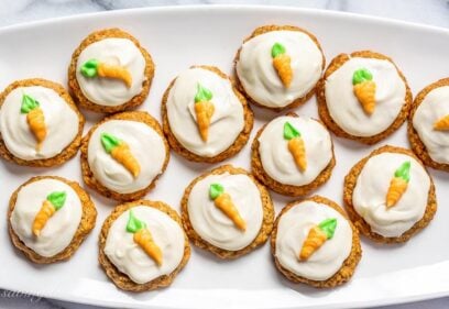 A platter of iced carrot cake cookies