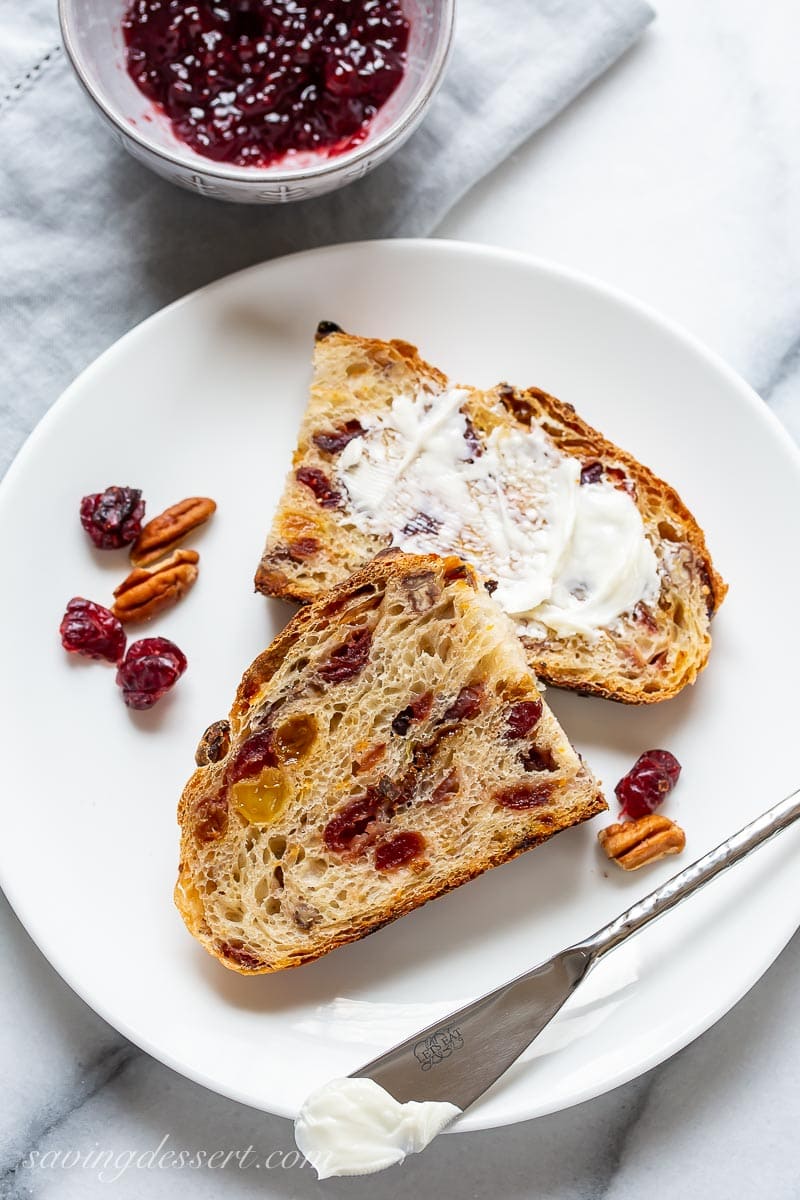 A plate with a slice of buttered Harvest bread