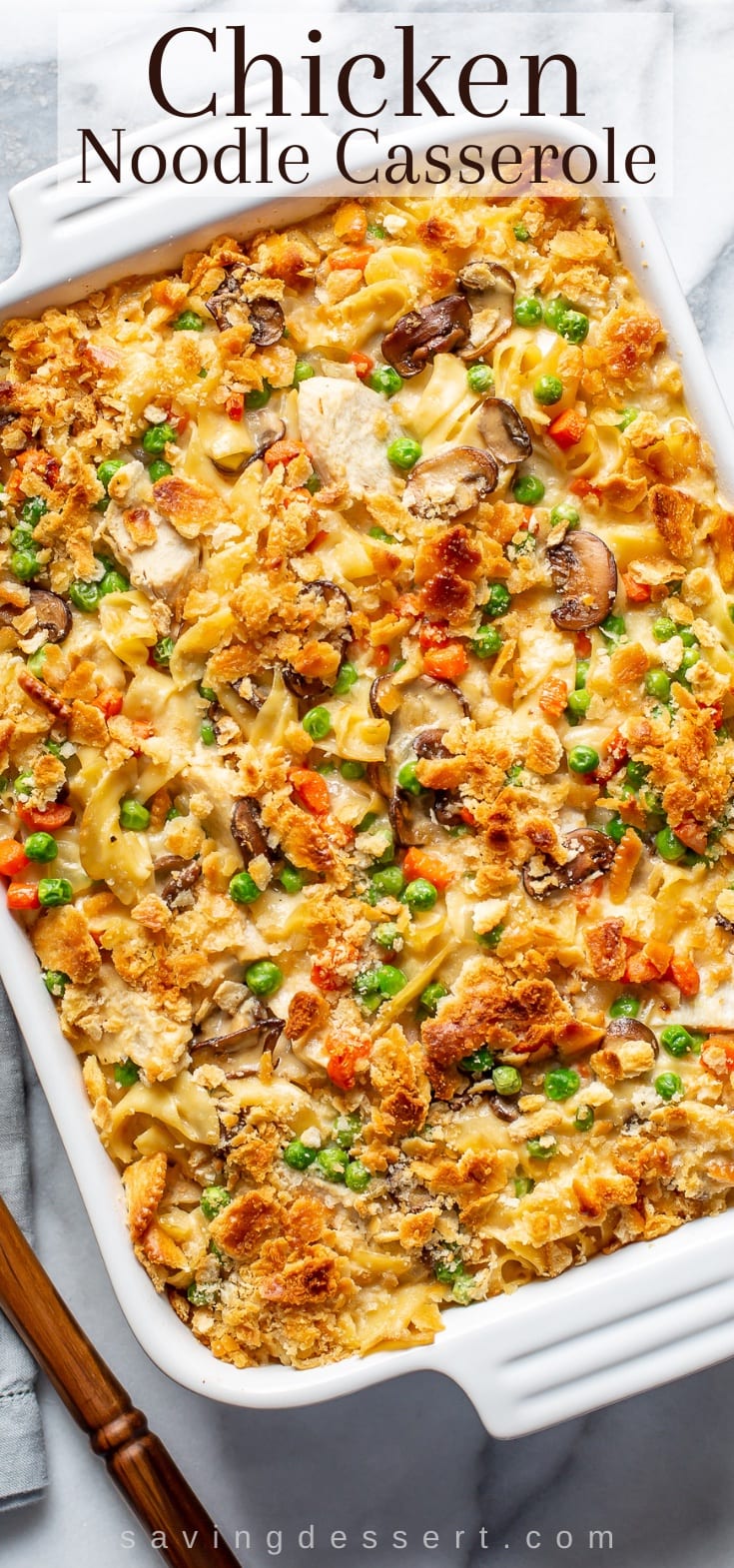 A casserole filled with golden brown Chicken Noodle Casserole