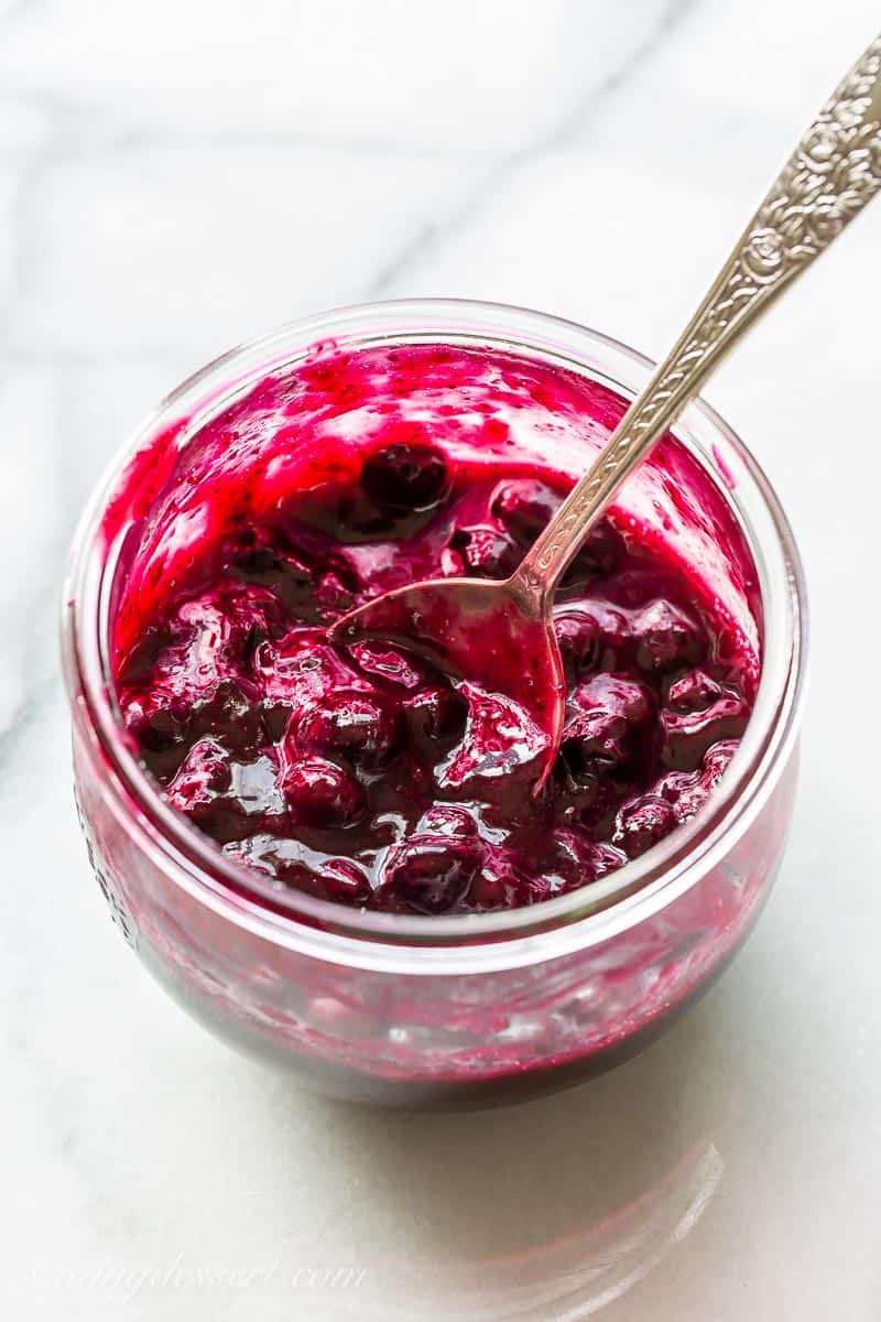 a jar a blueberry sauce for cheesecake
