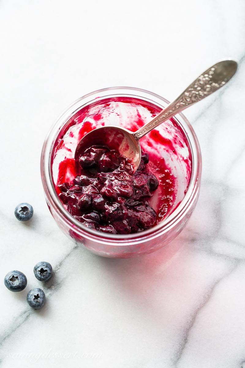 A jar of homemade blueberry sauce