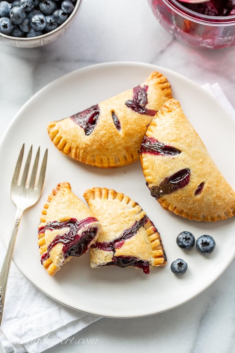 A dessert plate filled with blueberry pastries