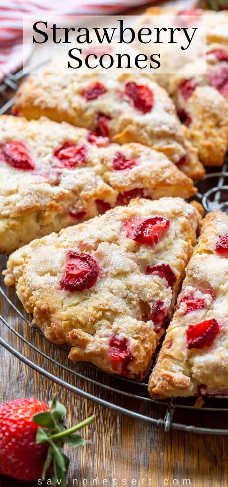 A closeup of strawberry scones on a cooling rack