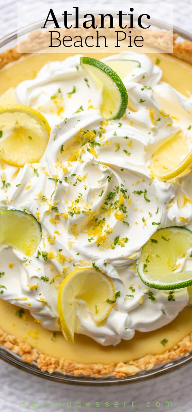 Closeup photo of a whole Atlantic Beach Pie with lemon and lime