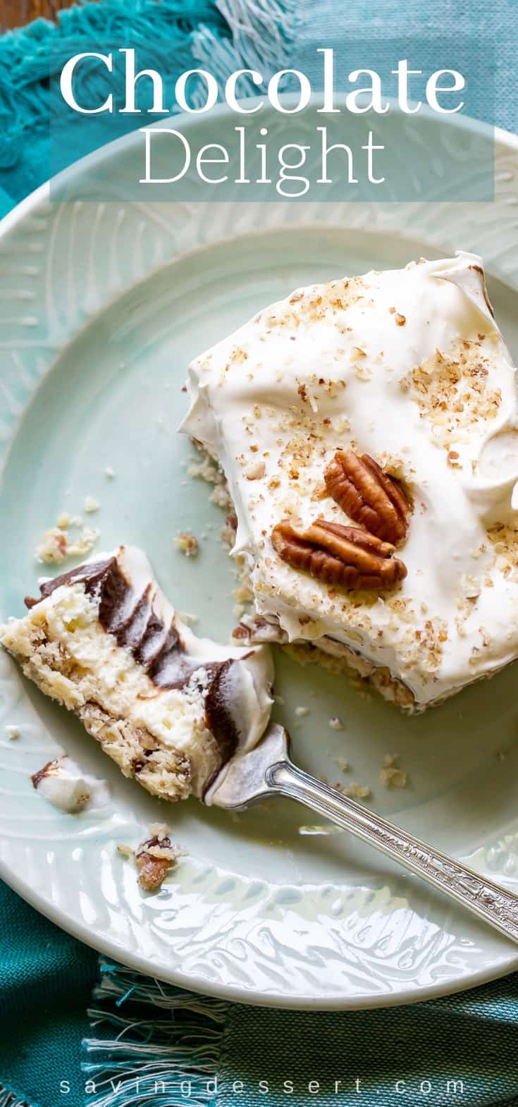 An overhead view of a slice of Chocolate Delight topped with whipped cream