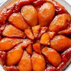 Overhead view of a pear tart over a pastry crust