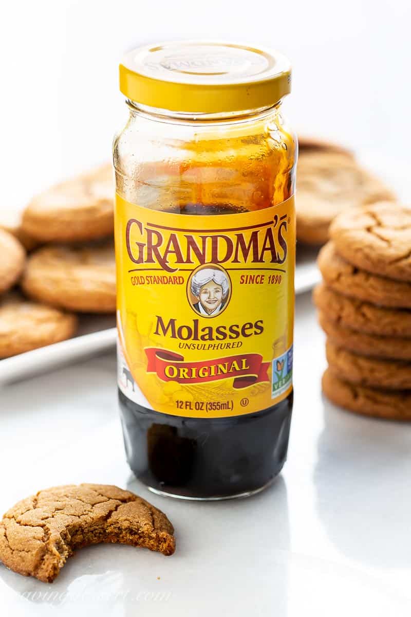 A closeup of a jar of molasses
