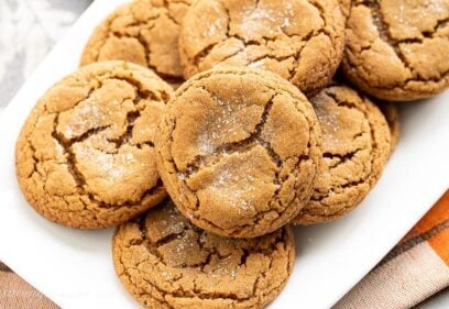 Closeup of a platter of crinkled molasses cookies