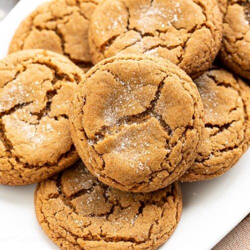 Closeup of a platter of crinkled molasses cookies