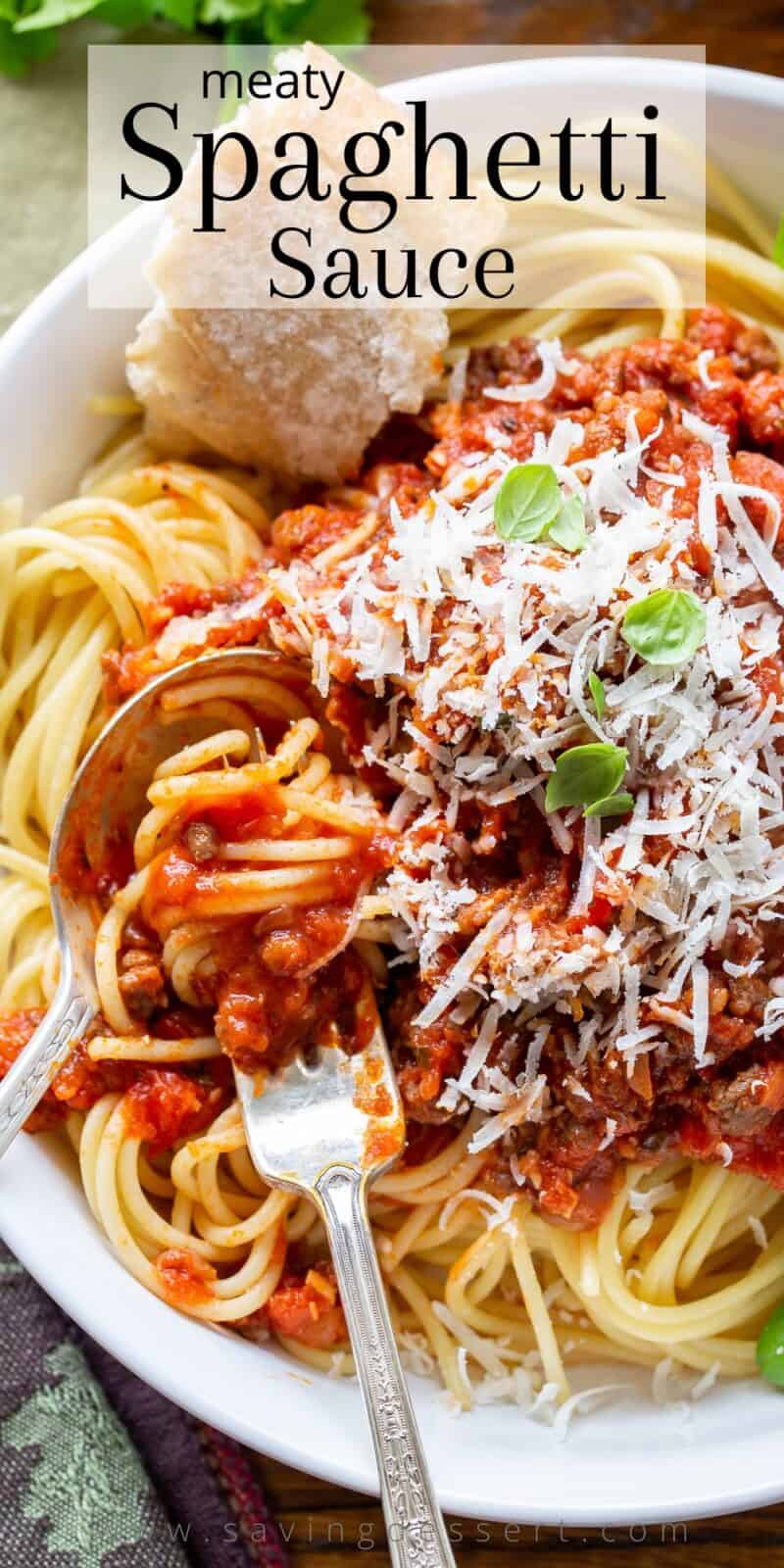Overhead view of a bowl of pasta covered in a rich meaty spaghetti sauce