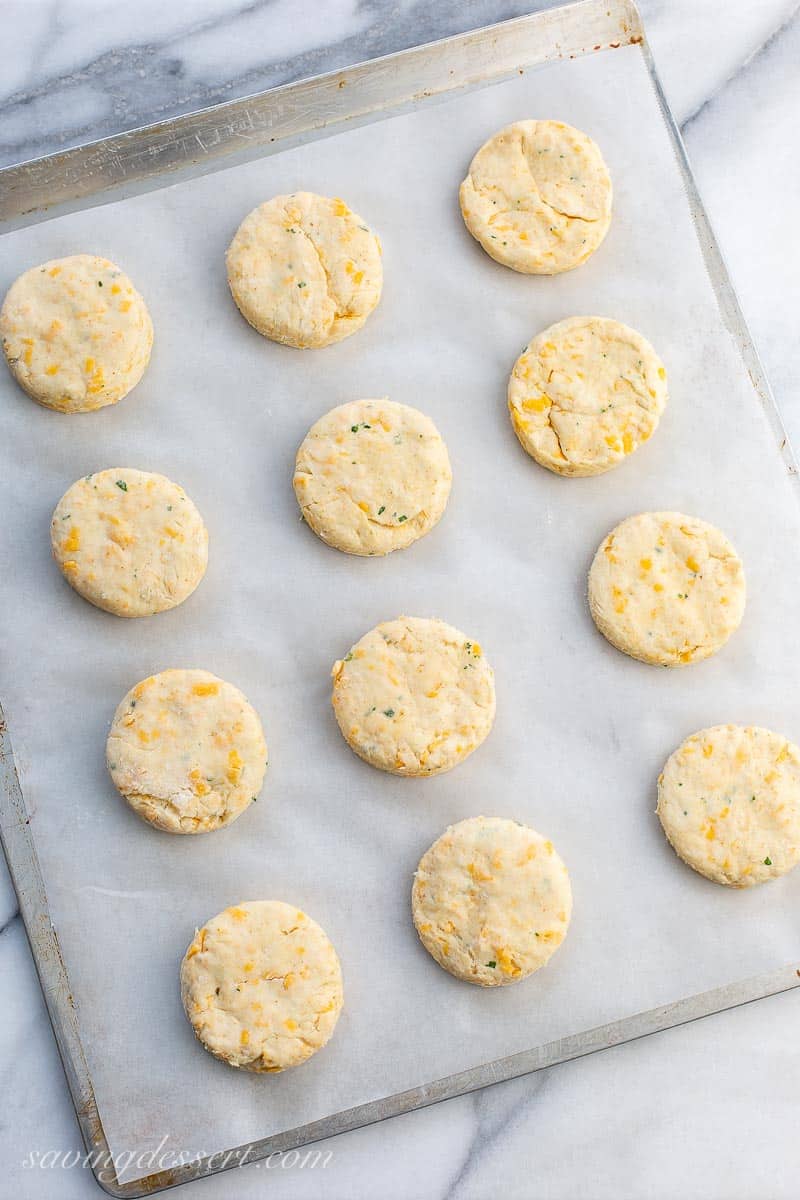 A baking tray of unbaked biscuits