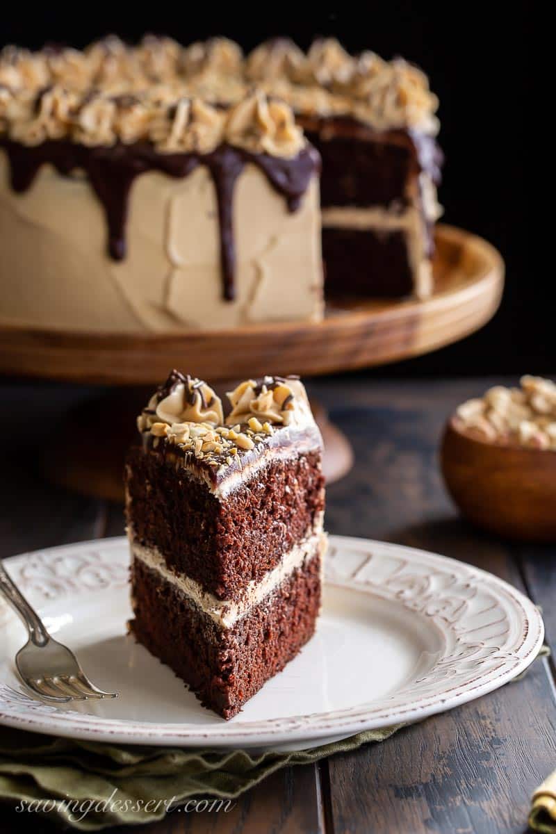 A big slice of chocolate cake with peanut butter frosting