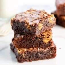 Brownies with a jug of milk and a fork