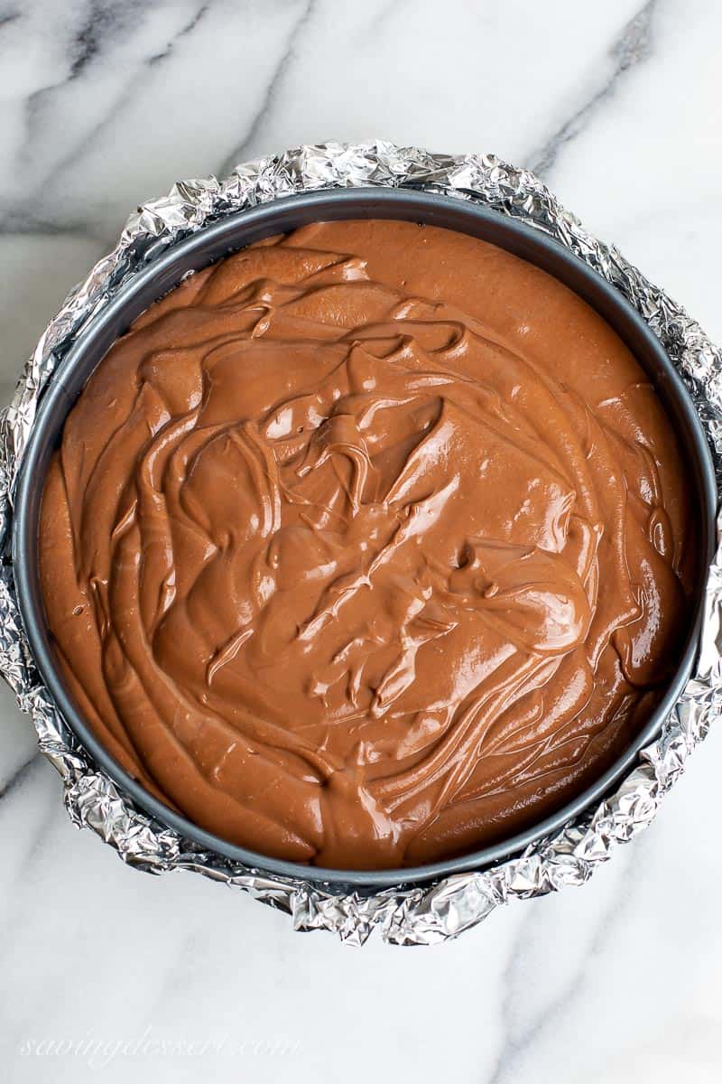 Overhead view of cake pan filled with chocolate cake batter