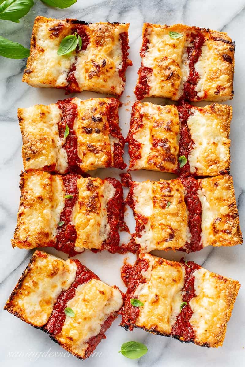 Sliced Detroit-Style Pizza on marble